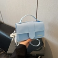 Light blue faux leather handbag with fashion logo and pearl lace charm detail - Blue