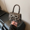 Mini dark brown leather crossbody bag with rhinestone bow and silver chain strap - Brown
