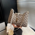 Beige vintage shoulder bag with brown clover pattern and gold chain strap detail - Khaki