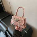 Mini bow handbag in beige monogram fabric with rhinestone accent and silver chain strap - Pink