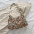 Hobo-Tasche aus beigem Jacquard-Stoff mit Blumenmuster und geknotetem Schulterriemen - Rot