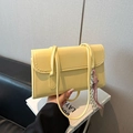Pale yellow PU leather baguette bag with braided tassel charm and flap closure - Single Bag / Yellow
