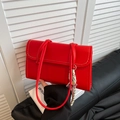 French baguette shoulder bag in bright red leather with wavy stitching and charm - Single Bag / Red