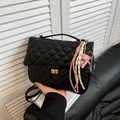 Black quilted rhombic pattern backpack with gold twist lock and woven rope accessory - Single Bag / Black