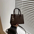 Mini woven handbag in dark brown leather with adjustable shoulder strap for urban women - Dark Brown