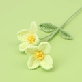Handmade crochet flowers in pale yellow with orange stamens and green leaves - Green