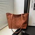 Caramel brown tote bag with floral embossing and dual shoulder straps for daily use - Brown