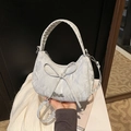 Chic silver crescent moon bag with ribbon bow detail and shiny metallic finish - Silver