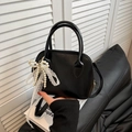 Elegant black shell-shaped handbag with lace trim and pearl bow charm detail - Single Bag / Black