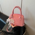 Pink shell-shaped crossbody bag with lace pearl bow charm and adjustable strap - Single Bag / Pink