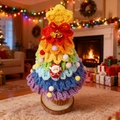 Hand-crocheted rainbow Christmas tree with festive ornaments and a wooden base - Gradient Purple Blue
