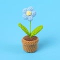 Handmade crochet forget-me-not flower in blue yarn with a brown knitted pot - Blue - Puff Flower Potted Plant - Mini Yarn Pot