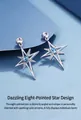 Detalle de los pendientes de estrella de plata S925 con circonitas azules y blancas - Pendientes de Botón de Estrella Luminosa de Circonita Azul