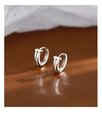 Macro detail of silver S925 earrings with T-shaped design on textured leather background - Geometric Double-Layer Ear Buckle