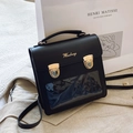 Classic black ita backpack with gold hardware and large transparent display window - Black