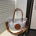 Light blue nylon tote bag with brown leather accents and adjustable wide shoulder strap - Small / Light Blue