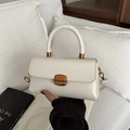 Elegant white oil wax leather crossbody bag with vintage bronze metal buckle and handle - White