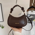 Dark brown leather saddle shoulder bag with knotted handle and fashion logo print - Black