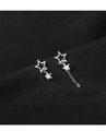 Macro shot of S925 silver asymmetric star earrings with long tassels and zircon stones - Asymmetric Star Studs / White Gold