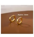 Macro view of 12mm geometric faceted gold hoop earrings with S925 hallmark - 12mm / Gold