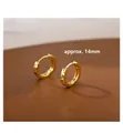 Macro detail of 14mm gold geometric hoop earrings with S925 engraving and diamond-cut facets - 14mm / Gold