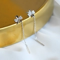 Silver S925 four-leaf clover tassel earrings with cubic zirconia on a gold display - Four-leaf Clover Ear Thread - Platinum Color