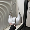 Metallic silver hobo bag in crescent shape with top handle for modern commute outfits - Silver