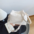 Creamy beige bucket bag with unique chunky braided strap and soft crinkled texture leather - Off White