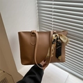 Caramel shoulder tote bag with white stitching and floral scarf handle wrap - Tan