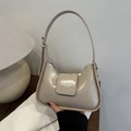 Elegant apricot faux leather baguette bag with high-gloss finish and shoulder strap - Khaki