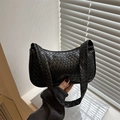 Minimalist black woven hobo bag with high-end texture and sleek shoulder strap design - Black