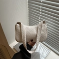 Minimalist beige woven underarm bag with large capacity and stylish shoulder strap handle - White