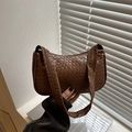Brown woven pattern underarm bag with minimalist hobo shape and top zipper closure - Tan