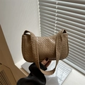 Chic khaki woven texture tote bag with wide handle shown in elegant natural window light - Khaki