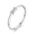 Polished S925 silver bow ring with sparkling pavé cubic zirconia on white background - Adjustable Open / White Gold