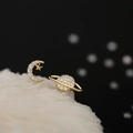 Macro shot of asymmetric s925 silver crescent moon and planet studs with cubic zirconia - Asymmetric Planet Studs-Gold