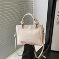 Creamy white lychee leather bucket bag with knotted handles and fashion logo - Off White