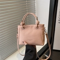 Pink lychee texture PU leather bucket bag with knot handle and detachable strap - Pink