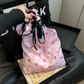 Pink floral drawstring canvas bag with black ruffles and bow pattern detail - Pink Bowknot