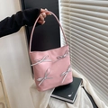 Pink bucket shoulder bag with silver bows and sleek finish for women's daily fashion - Pink