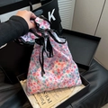 Floral drawstring canvas bag with ruffle trim and black contrast edging in soft fabric - Purple Flower