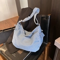 Borsa a tracolla in denim azzurro di grande capacità con tracolla regolabile - Azzurro