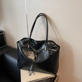 Classic black leather tote bag with stylish buckle strap and large capacity for commuting - Black