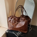 Vintage dark brown tote bag in shiny PU leather with long handles and metal buckle detail - Coffee