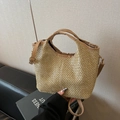 Straw woven handbag in beige with light brown leather handles and adjustable strap - Khaki