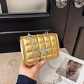 Gold quilted mini chain bag with silver rhinestone star and metallic finish for women - Gold