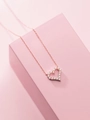 Dettaglio ravvicinato della collana a cuore in argento S925 con zirconi scintillanti - Oro rosa