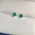 Macro shot of green enamel floral earrings on a cream leather jewelry box interior - Drip Glue Flower Screw Stud Earrings - Sky Blue