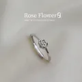 Macro shot of S925 silver rose ring featuring hollow petals and adjustable open band - Adjustable Open / Silver Hollow Rose (JZ048)