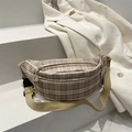 Brown checkered crossbody waist bag with double zippers on white corduroy backdrop - Khaki